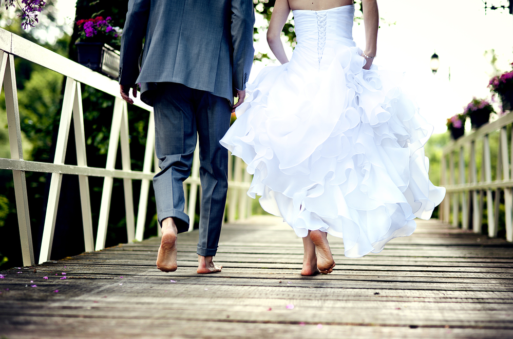 Barefoot wedding couple
