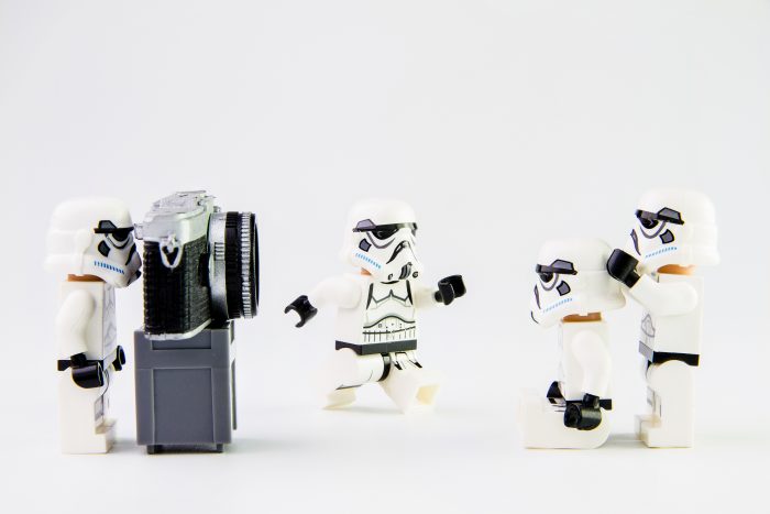 lego stormtroopers taking a photograph