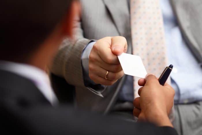 businessmen exchanging their photography business cards
