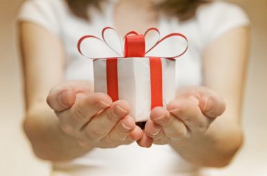 wrapped gift in girl's hands