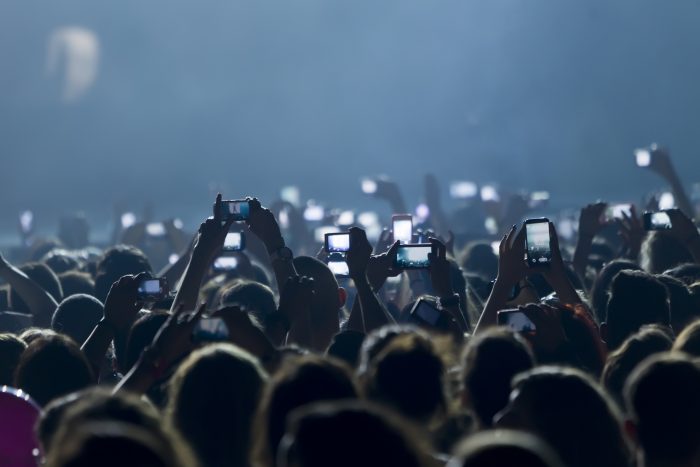 photo of many people at a concert event photography